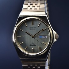 SEIKO quartz silver wave 5933 gold with genuine strap serviced