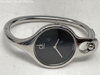 Calvin Klein Women's Silver Bangle Watch Black Dial