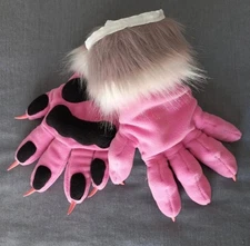 The animal's fluffy rat paws were made by hand.