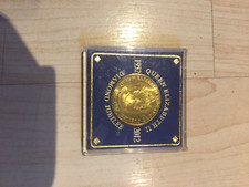 unopened queen elizabeth diamond jubilee coin in plastic bix