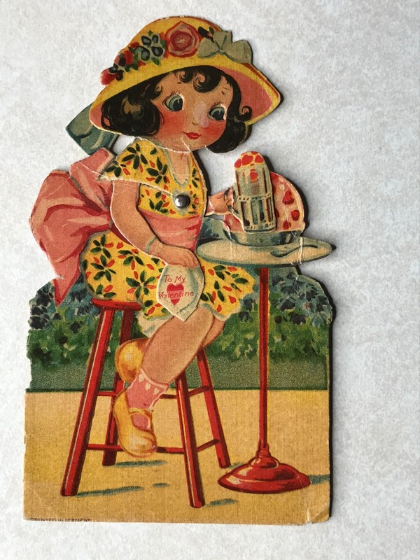 P649 Vintage Postcard Little Girl with Hat Sitting at Table Valentine