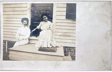 Vintage Eyewear Postcard Woman On Porch Unposted Long Skirts