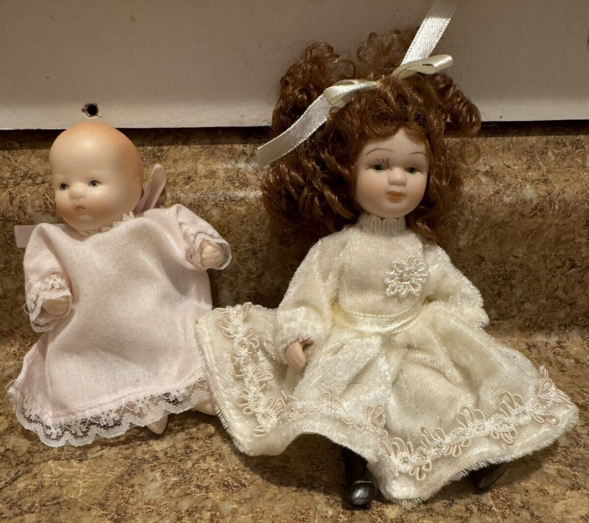 Two Porcelain Dolls Moveable Legs & Arms one Russ Berrie one unbranded