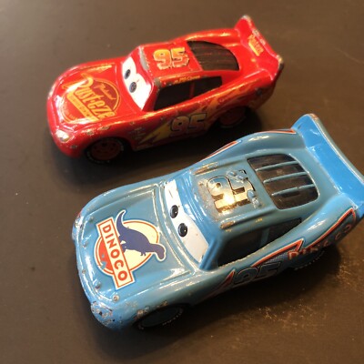 Disney Pixar Cars Diecast Lot Of 2 Lightning McQueen Red Blue Rust-eze Dinoco