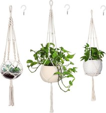 Three-pack macrame plant hangers with hooks.