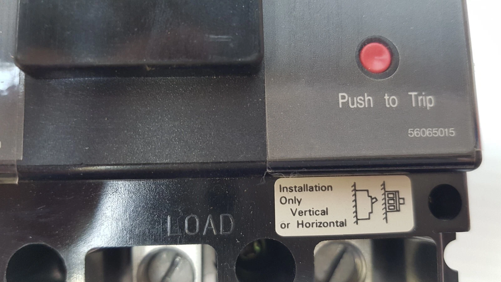 Push to Trip button and Installation Only Vertical or Horizontal label