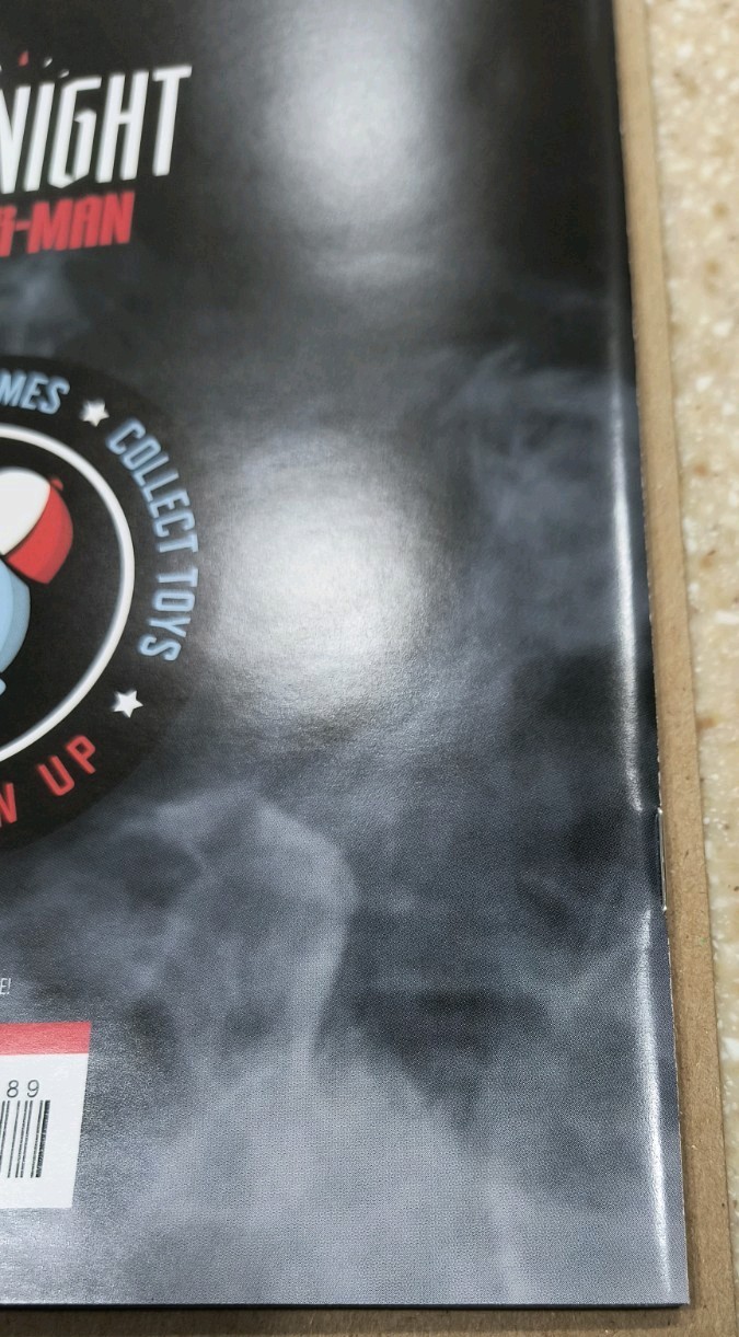 Smudged black cover of Midnight Spider-Man #1 with white title, red eye, and Marvel logo.