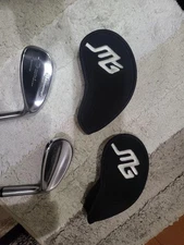 Miura wedge. It is in good condition at 50 degrees and 56 degrees. Only the