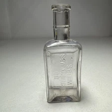 Antique Clear Glass Embossed Bottle "Sperm Sewing Machine Oil"