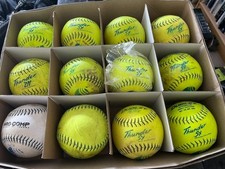 12 used Dudley Thunder SY 12 inch USSSA Classic M softballs 1 brand new 1 white