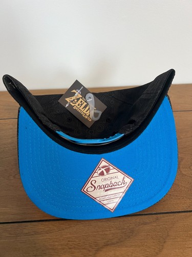 Zelda Breath of the Wild Sheikah Eye Patterned One Size Snapback Hat Black/Blue - Picture 2 of 5