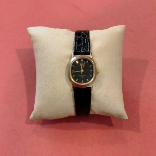 Q&Q watch w/ Blk dial-Blk leather straps-has unique back case snaps.