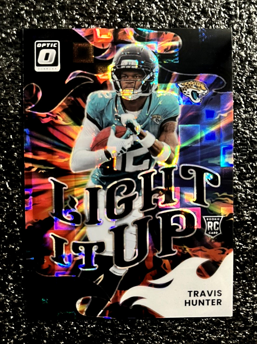 2025 Panini Donruss Optic Travis Hunter Light It Up RC Black Pandora Prizm #/149