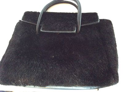 black faux fur handbag