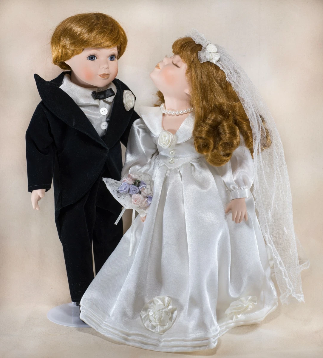 Bride and shop groom porcelain dolls