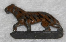 OLD METAL PAINTED TIGER - 2 1/4 INCHES LONG AND 1 1/2 INCHES TALL
