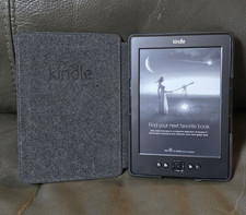 Amazon Kindle E-Read - Graphite Grey Model D01100 Fully Working  Good Battery