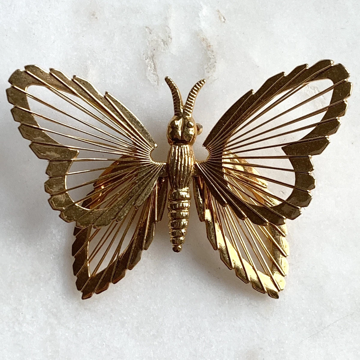 Monet gold butterfly brooch best sale