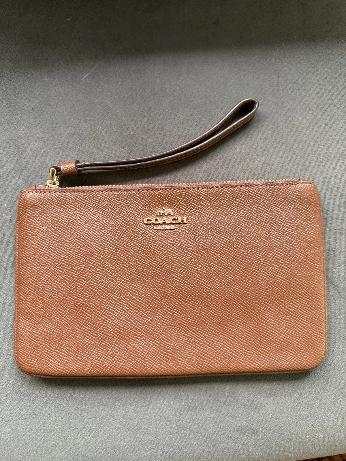 Pochette Coach originale in pelle marrone