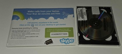 promotional card for Skype and a Toshiba Windows Vista recovery DVD.