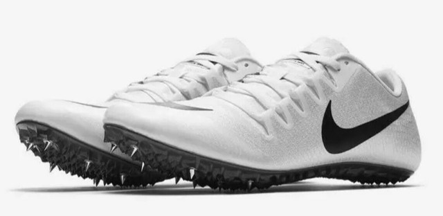 black and white nike spikes