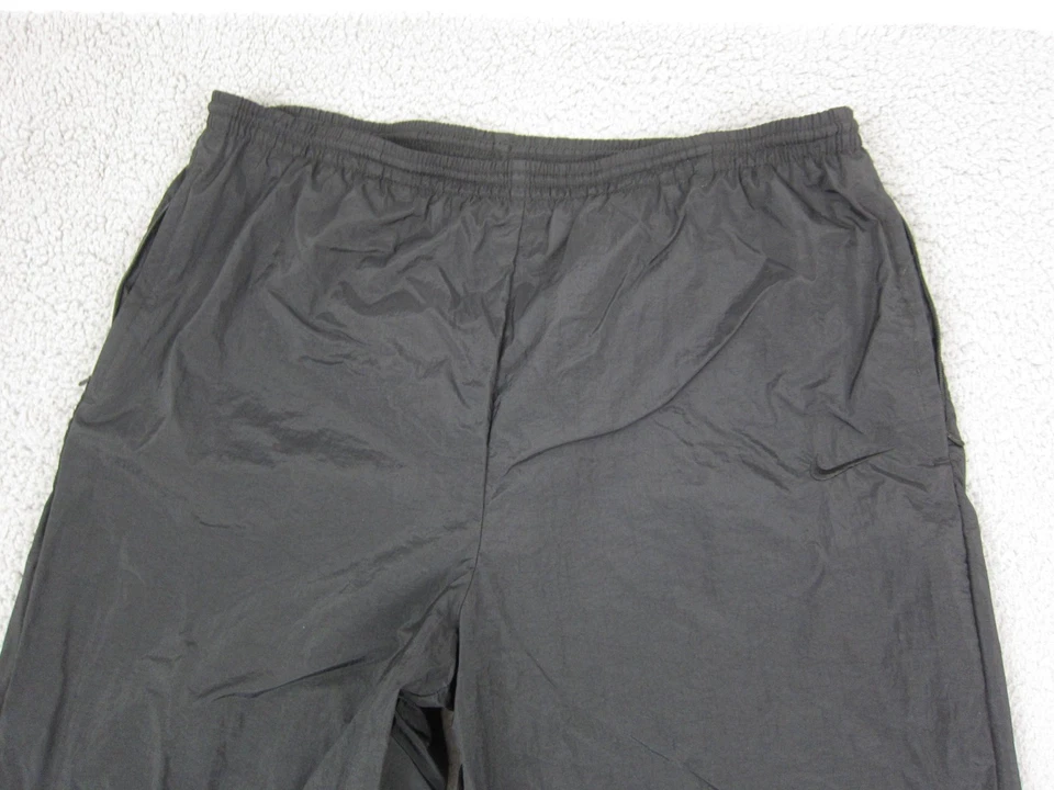 Pantalones NIKE Jóvenes Niños Grandes 12-14 Negro Nylon Cortavientos Atléticos Aire Libre Niños Foto 2 de 4