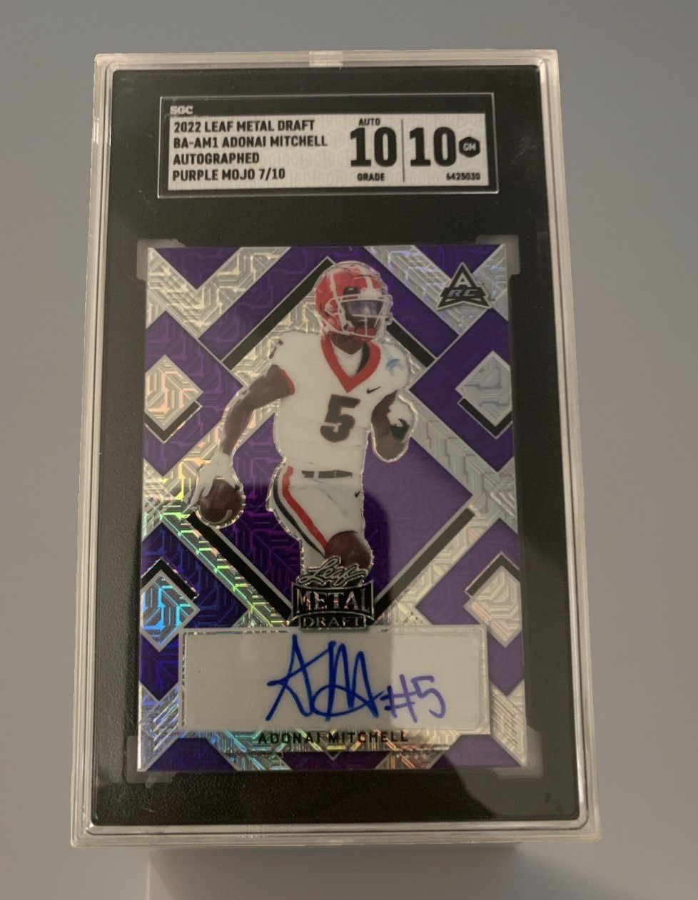 2022 Leaf Metal Draft Adonai Mitchell #BA-AM1. Purple Mojo 7/10 Autographed.