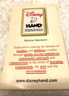 DISNEY "VOLUNTEARS" OUTREACH (HELPING HAND) PIN ON CARD 2003 - MINT — photo 1