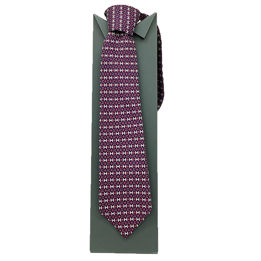 Corbata de sarga de seda HERMES patrón H azul marino x rosa, hecha en Francia Foto 2 de 3