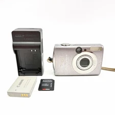 Canon PC1209 PowerShot SD800 IS Elph 7.1MP Digital Camera, Battery, Charger, Etc