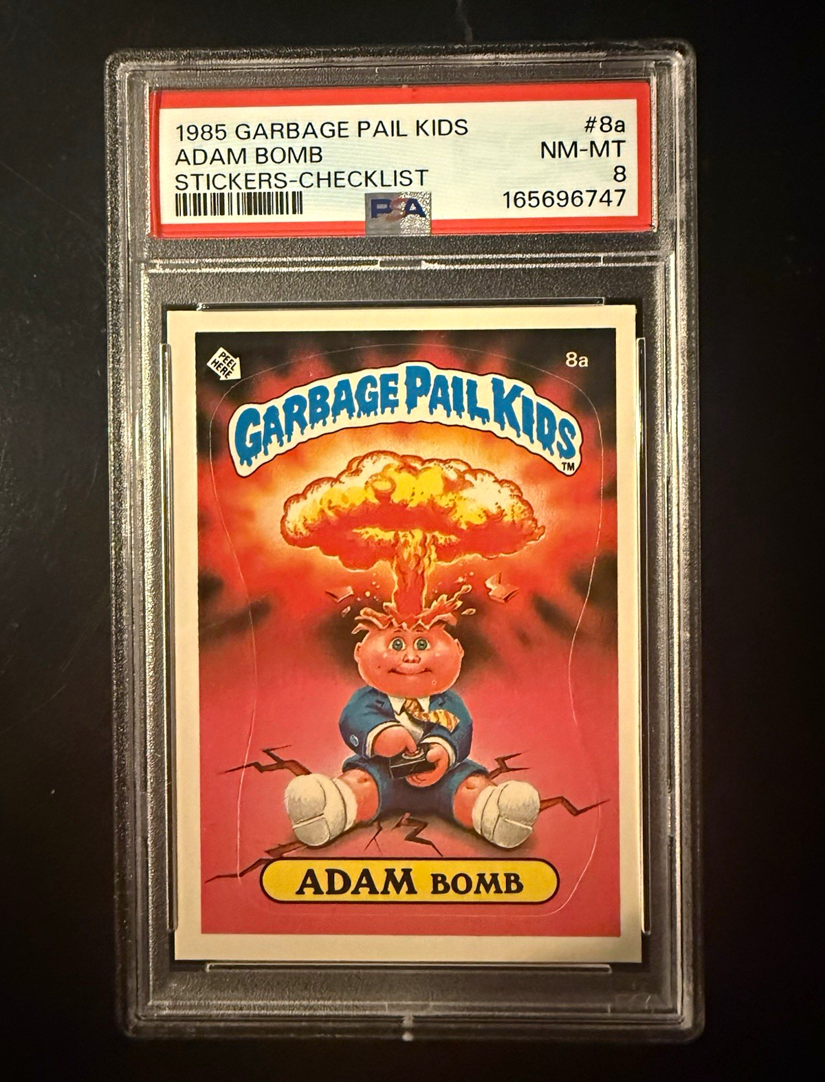 Adam Bomb #8a PSA 8 1985 Garbage Pail Kids Series 1 Checklist Sticker view 1