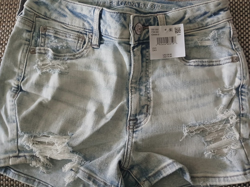 American Eagle Next Level Stretch Distressed Light Wash Denim Shorts