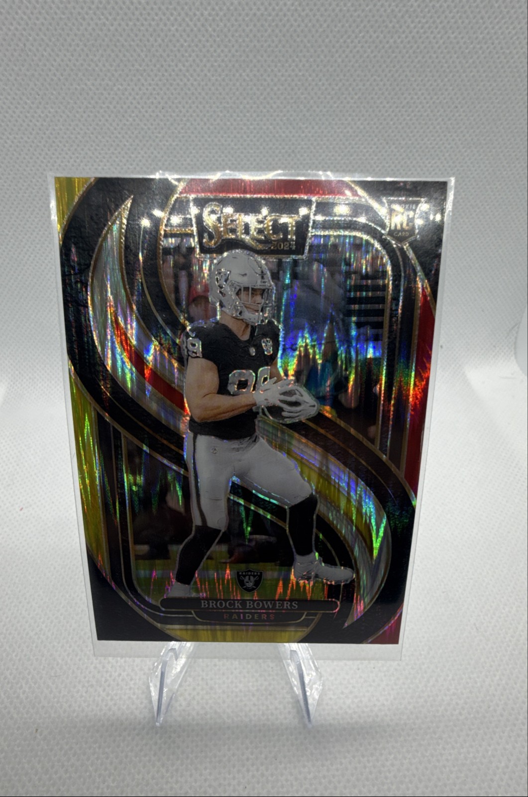 2024 Panini Select - Premier Level Brock Bowers #118 Red & Yellow Shock Prizm