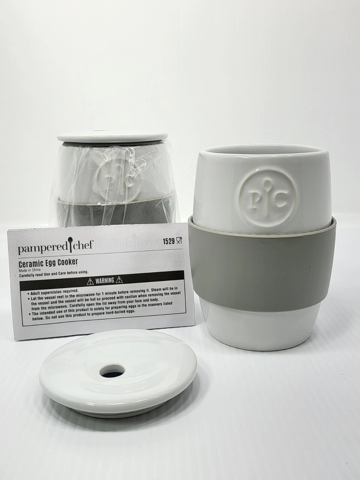 TWO Pampered Chef Ceramic Egg Cookers With Silicone Sleeve And Lid
