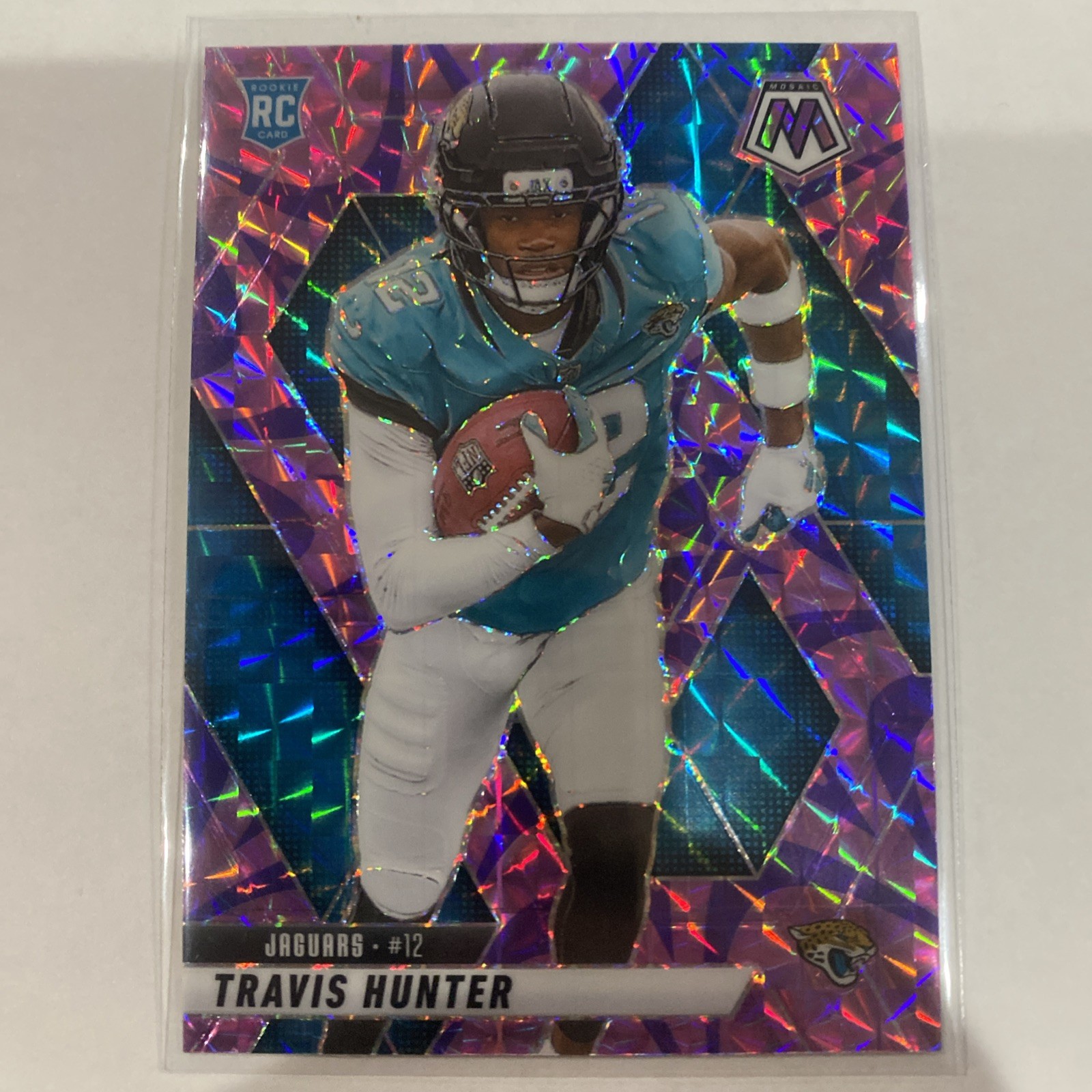 2025 Panini Mosaic Travis Hunter Rookies RC Reactive Purple Prizm #301 Jaguars