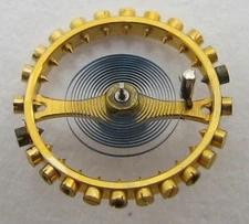 LeCoultre 496 Lady backwind watch part: complete balance wheel #721