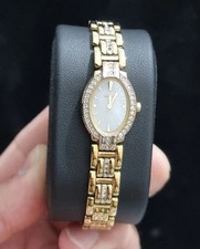 Citizen Eco-Drive Gemmed Bezel B023 243. Mother of Pearl Gold Tone Womans Watch