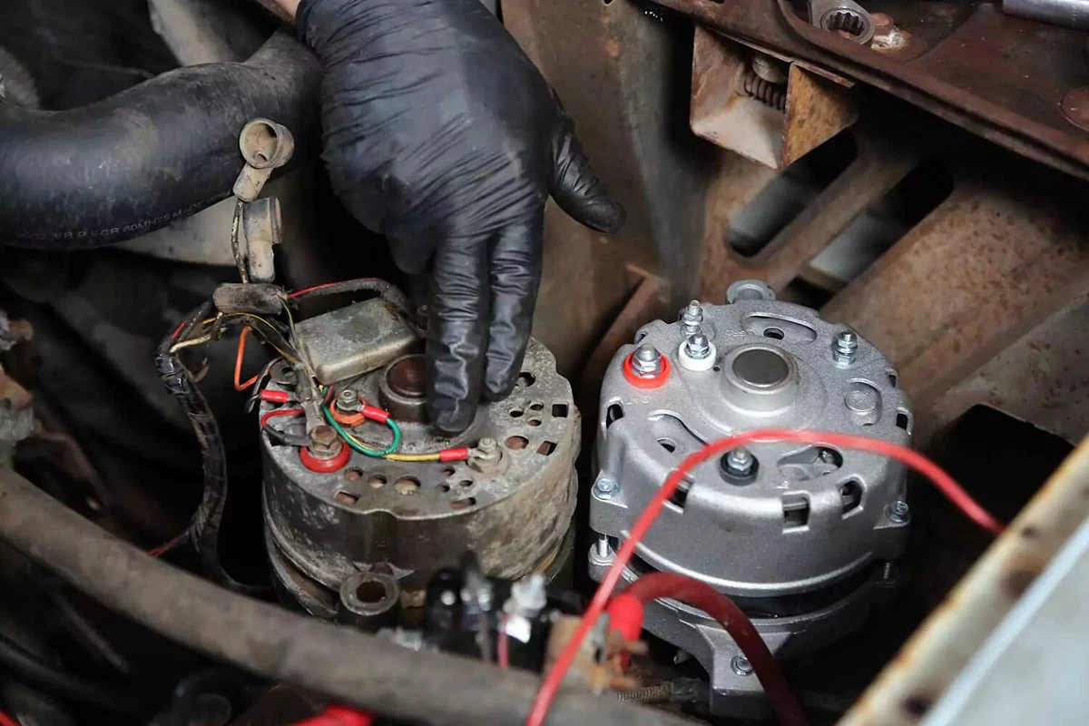 Two alternators with wiring on the backside.