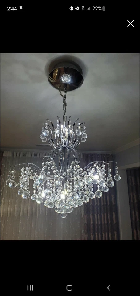 Lámpara de araña clásica de cristal Empire Heritage con acabado cromado de 8 luces. Ligeramente usado. Foto 2 de 4