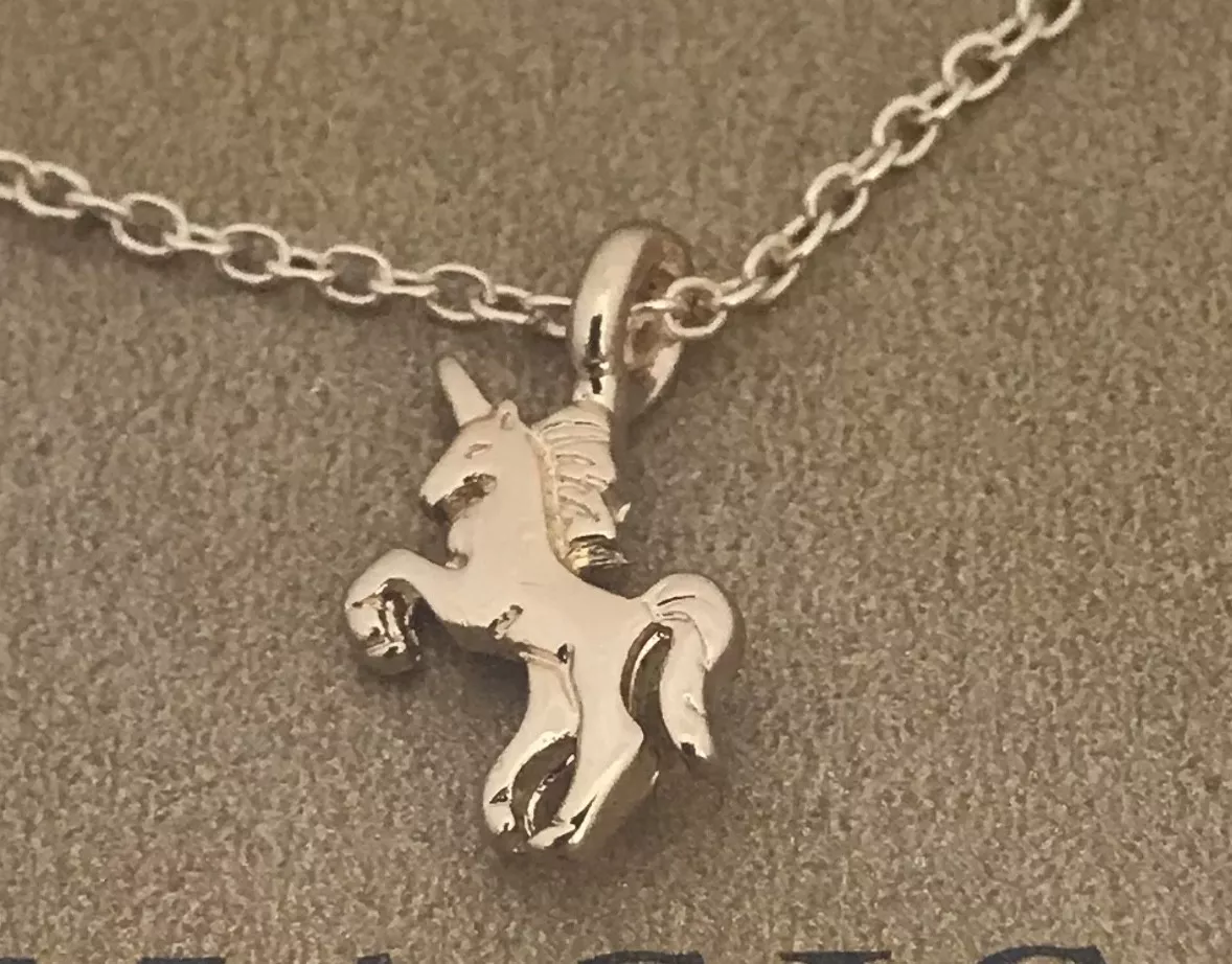 Gold Dipped Unicorn Necklace perfect for any occasion Life is
