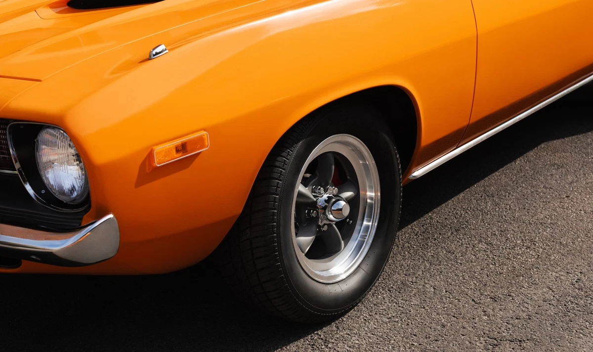American Racing Torq Thrust alloy wheels / Cobra Radial T/A GT tires.