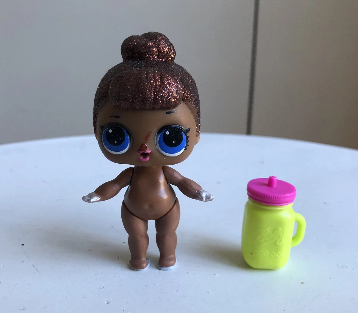 Lol doll with brown glitter hair hotsell