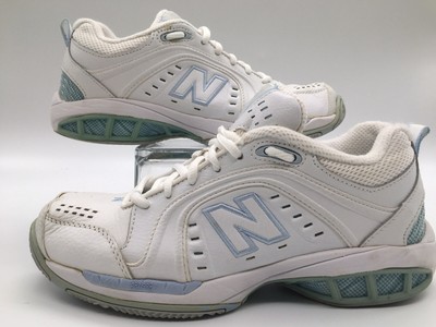 white leather running shoes