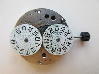 EB Bettlach cal. 8800 Jumphour Swiss watch movement - running - needs cleaning