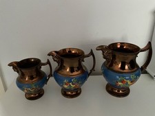 Antique Copper Lustre embossed StaffordshirPottery Graduated Jugs x 3 c. 1840's