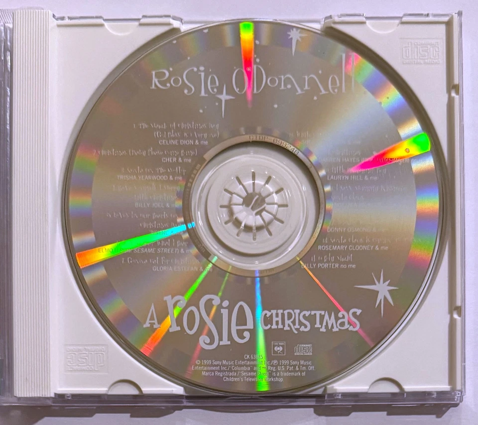 A Rosie Christmas CD 1999 Holiday Celine Dion Elton John NSYNC Billy Joel Cher Foto 3 de 4