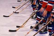 General View Of Hockey Sticks As The Players Line Up 1980 Ice Hockey Photo