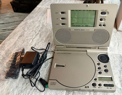 Sharper Image Portable CD Player Radio Alarm Clock Bundle w/Power Supply - SI585