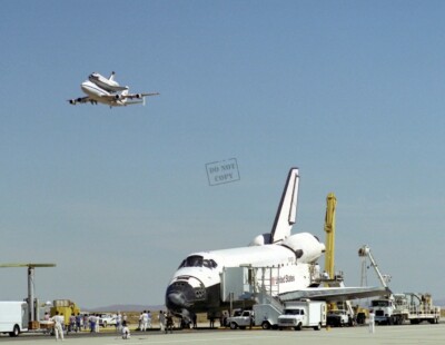 Endeavour on Runway with Columbia on SCA Overhead Space Shuttle 8X12 PHOTOGRAPH