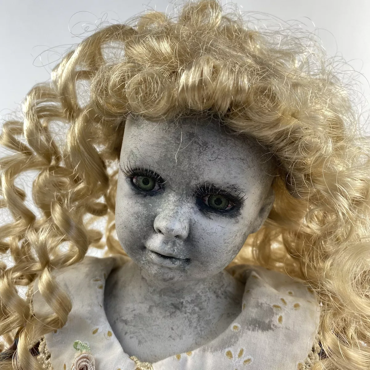 Head Of An Old Broken Doll With Blonde Hair Torn And Weathered By Fire On A  Black Background High-Res Stock Photo - Getty Images